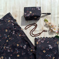 Mukena de voyage fleuri noir, pochette et tissu